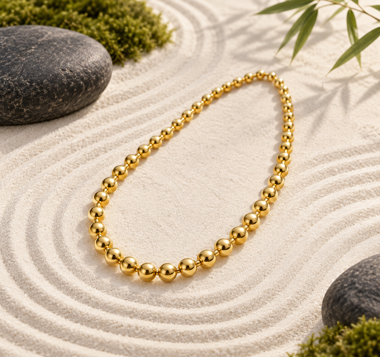 Gozen full gold pearl necklace styled on a neutral Japanese-inspired background